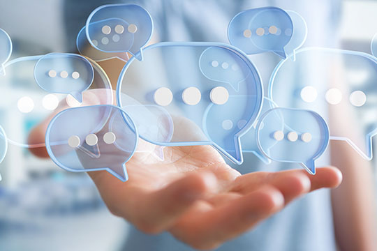 Magnet - Sprechblasen die über einer Hand schweben